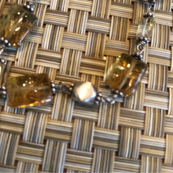 Simply Stunning  amber coloured bracelet with silver bead accents in between - Picture 9 of 13